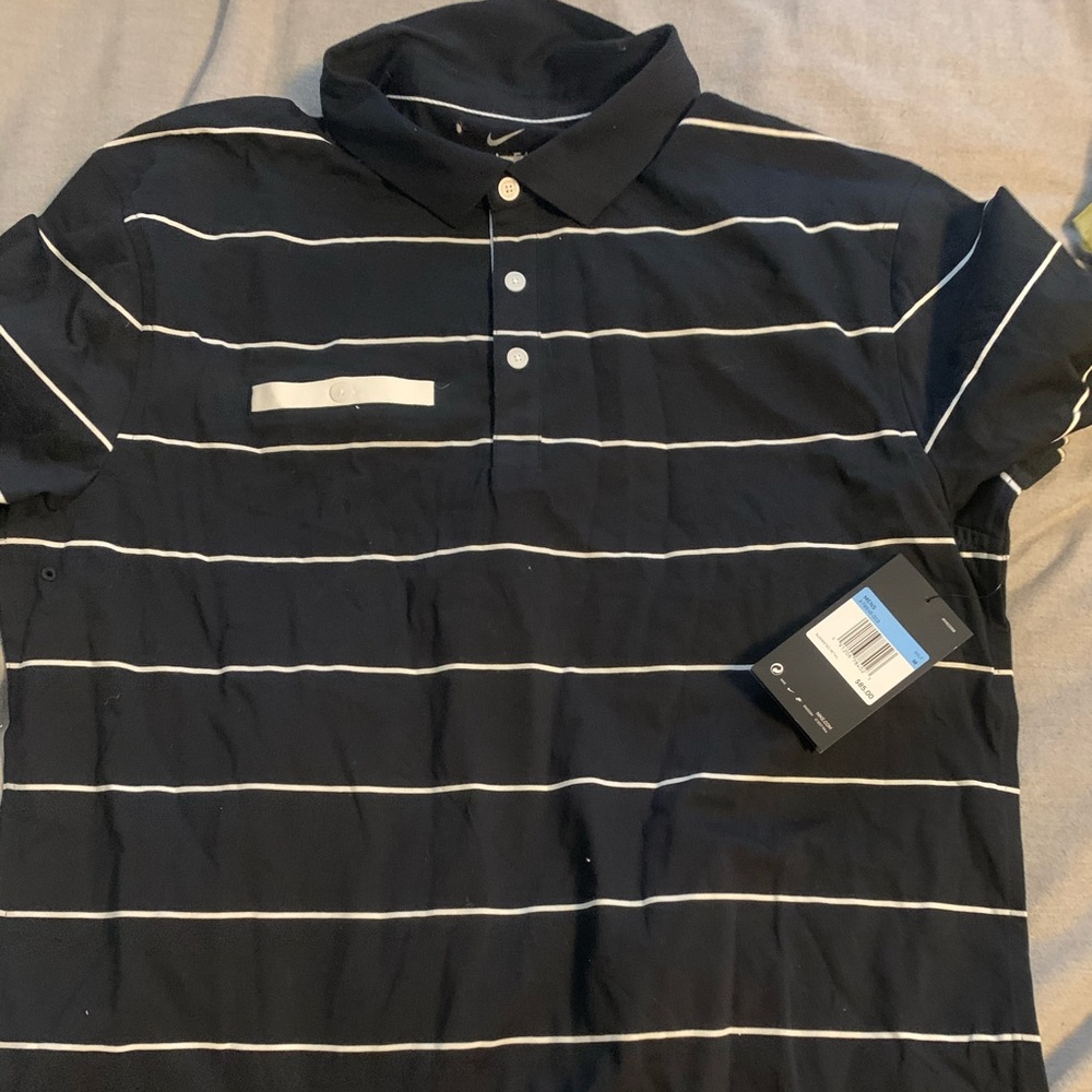 BRAND NEW 2019 Nike Golf polo. Medium.